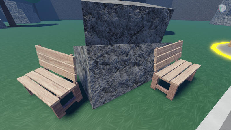 Rock and two wooden benches